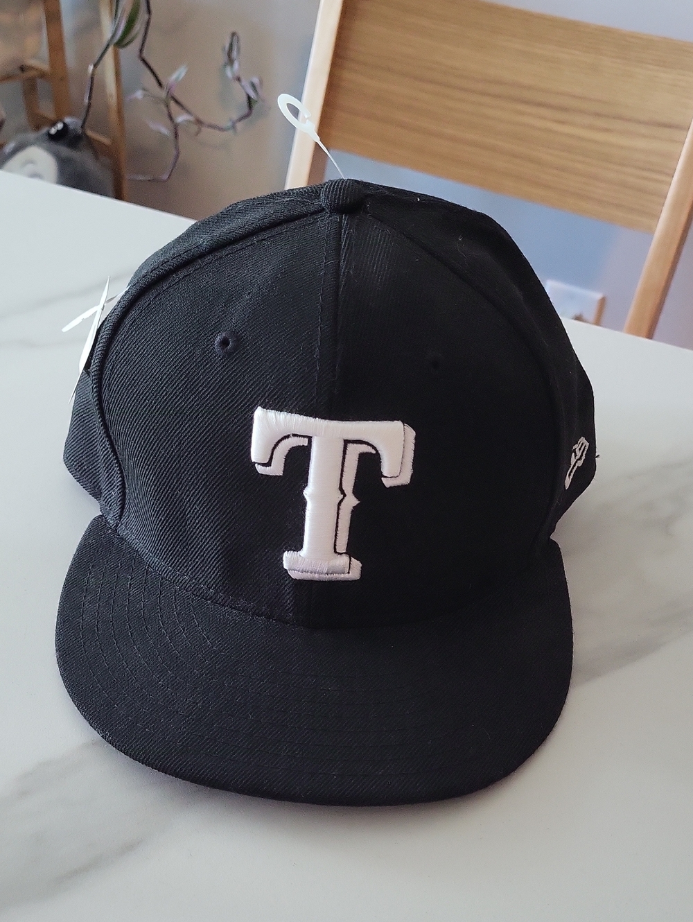 Black Baseball Cap with White 'T' Patch